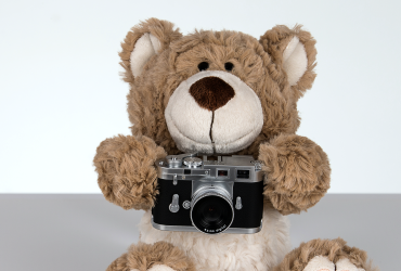 Doudou avec un appareil photo